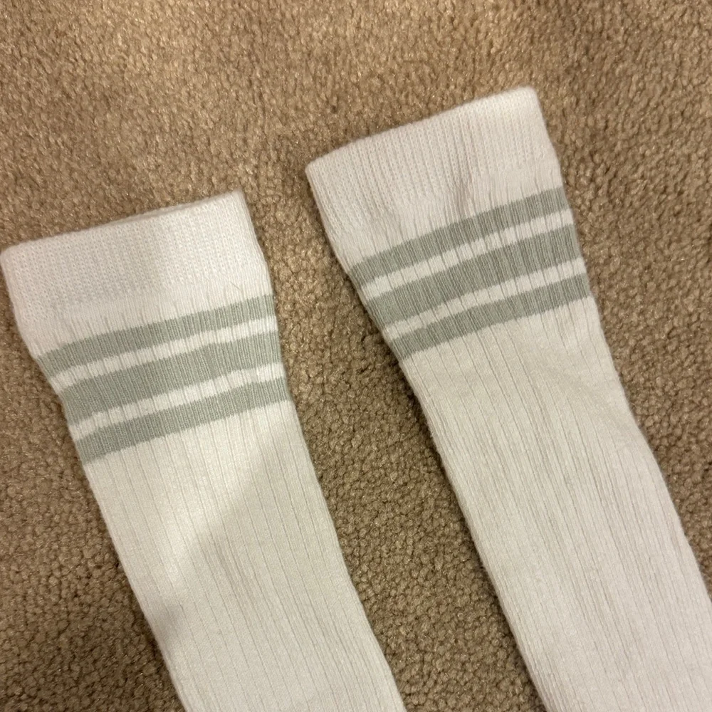 Danzy White and Gray Athletic Socks. Long socks. Written both sides. EUC